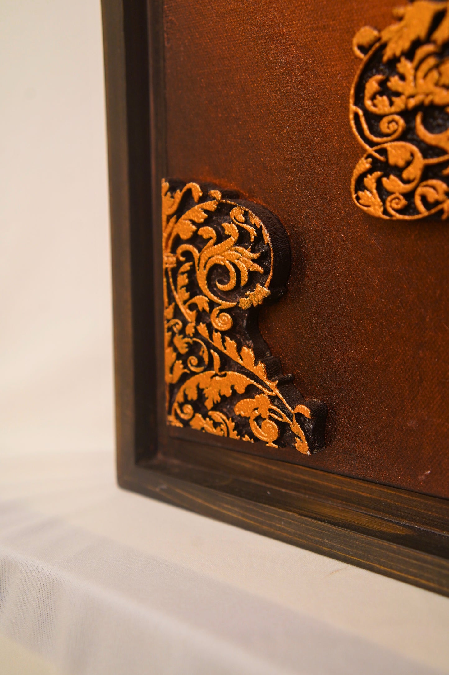 Ornate Harmony: Triptych in Copper and Ebony